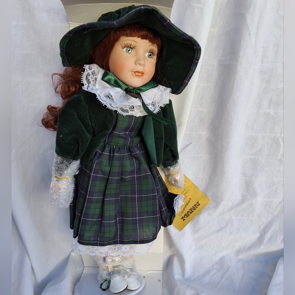 Seymour Mann Christmas Porcelain doll NEW